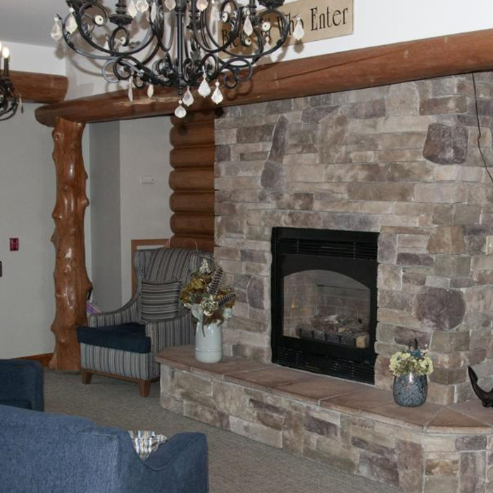 Large stone fireplace for residents to enjoy